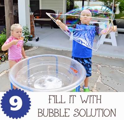 Fill It With Bubble Solution {10 Fun Things to Do with Your Water Table}